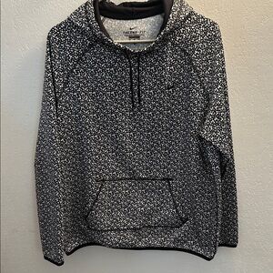 40. Nike Therma-Fit Women’s Black and White Printed Pullover Sweater